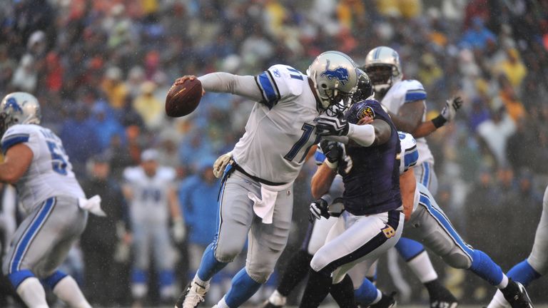 BALTIMORE - DECEMBER 13:  Daunte Culpepper #11 of the Detroit Lions is pressured during the first half against the Baltimore Ravens at M&T Bank Stadium on 