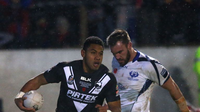 David Fusitu'a scores a try against Scotland