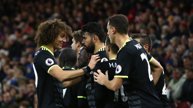 Diego Costa of Chelsea celebrates scoring the opening goal with David Luiz