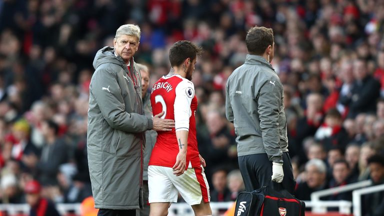 Mathieu Debuchy was substituted just 15 minutes into is Arsenal return