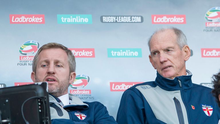 England coaches Denis Betts & Wayne Bennett look on dejected at the performance of their side against Australia.