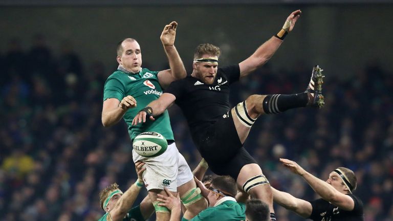 Ireland's lock Devin Toner (L) and New Zealand's number 8 Kieran Read jump for a line out