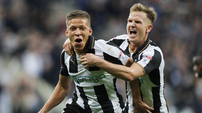 Dwight Gayle celebrates scoring his third and Newcastle's fourth goal of the game