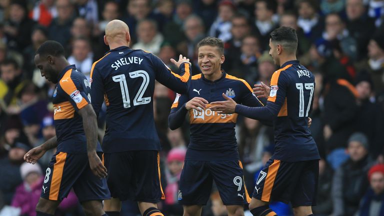 Newcastle United's Dwight Gayle (centre) celebrates scoring his side's second goal