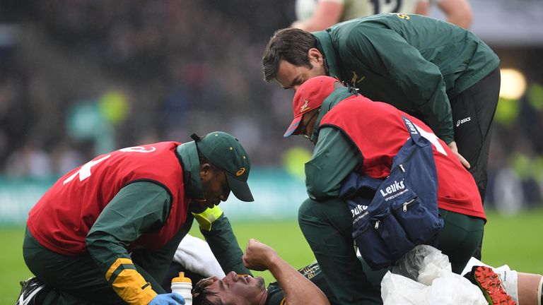 LONDON, ENGLAND - NOVEMBER 12: Eben Etzebeth of South Africa receives medical treatment during the Old Mutual Wealth Series match between England and South