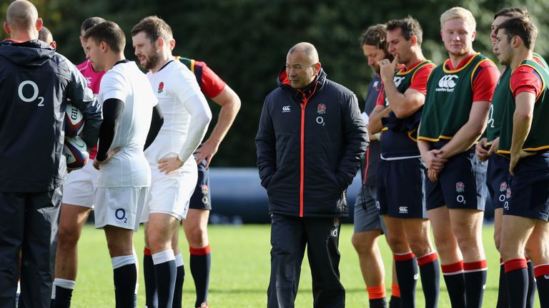 Eddie Jones walks among his players during their 32-minute training session at Pennyhill Park on Thursday