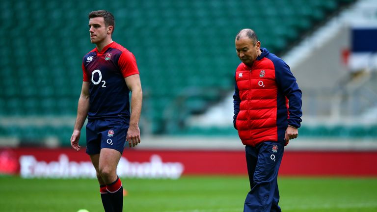 Eddie Jones, Head Coach of England speaks with George Ford during an England Rugby open training session at Twickenham Stadium