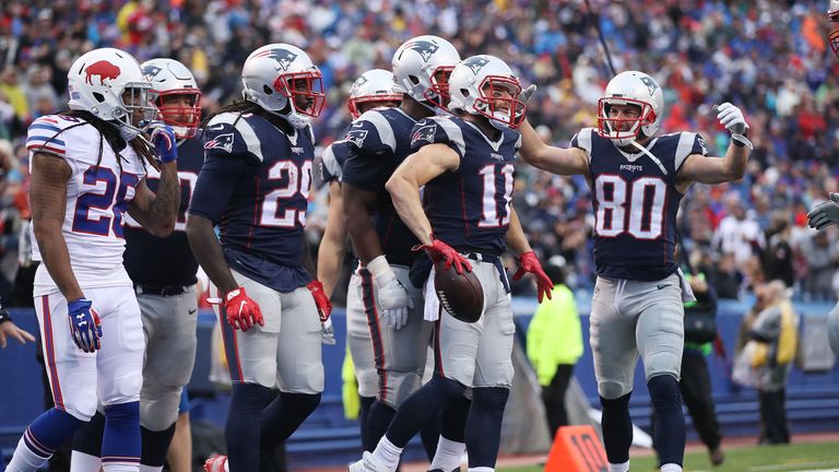 BUFFALO, NY - OCTOBER 30:   Julian Edelman #11 of the New England Patriots celebrates a touchdown against the Buffalo Bills during the second half at New E