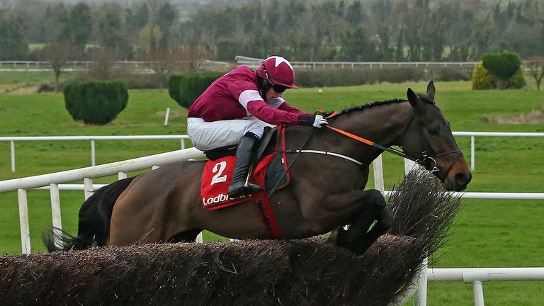 Empire Of Dirt, ridden by Bryan Cooper, jumps the last to win the Ladbrokes Troytown Handicap Chase at Navan.