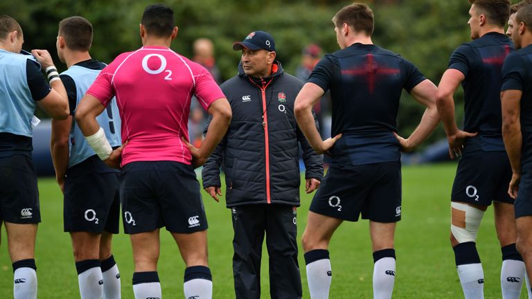 England head coach Eddie Jones (C) takes a team training session 