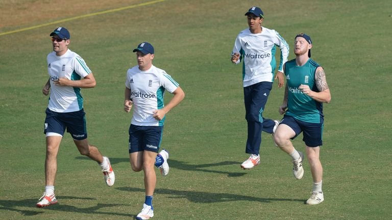 (L-R) England's captain Alastair Cook, Jos Buttler, Haseeb Hameed and Ben Stokes jog during a training session at the Brabourne Stadium in Mumbai on Novemb