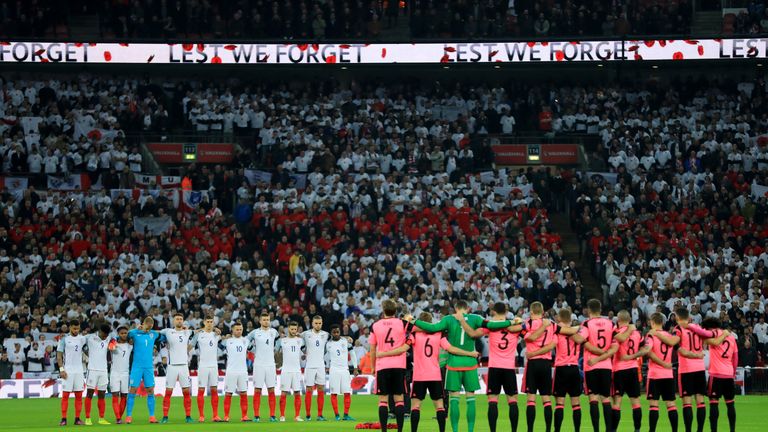 LONDON, ENGLAND - NOVEMBER 11:  Players, officials and fans observe a silence in remembrance of Armistice Day prior to the FIFA 2018 World Cup qualifying m