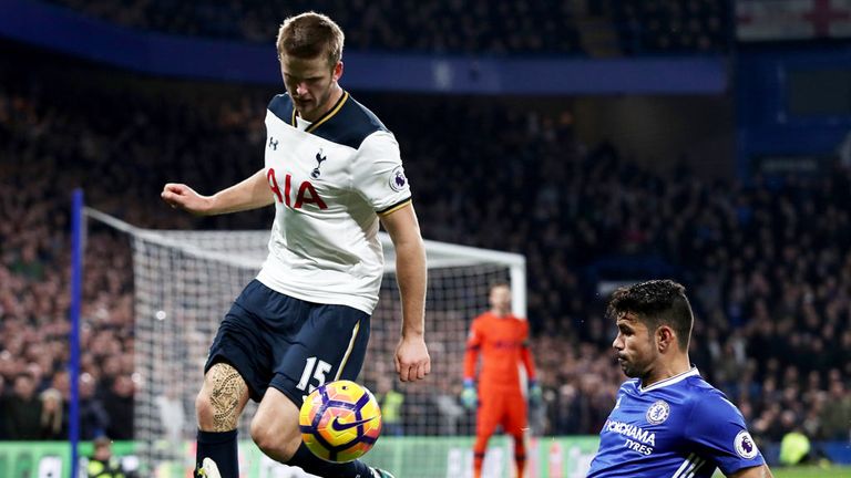 Tottenham defender Eric Dier (L) is challenged by Chelsea's Diego Costa