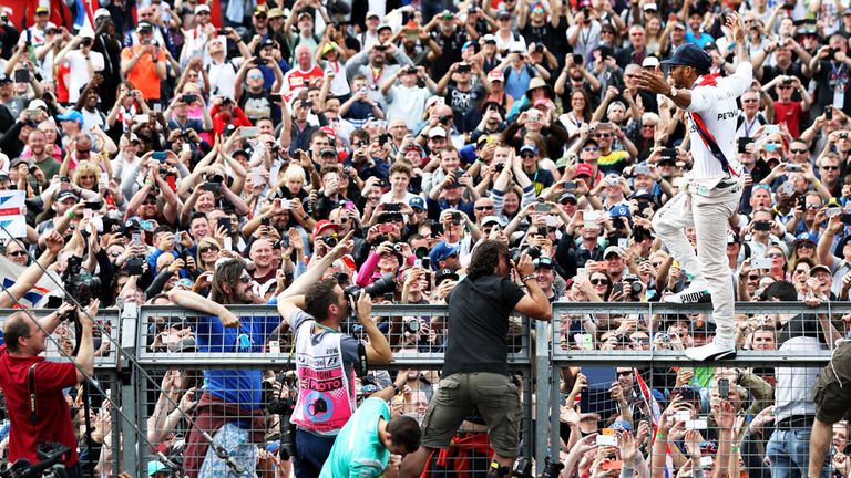 Lewis Hamilton celebrates with the Silverstone crowd after his British GP victory - Picture from Getty Images