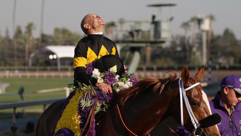 Mike Smith celebrates his 24th winner at the Breeders' Cup after Finest City took the Filly & Mare Sprint.