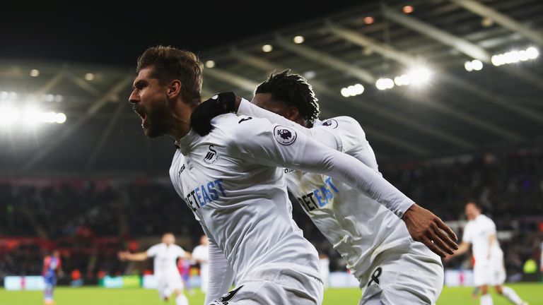 SWANSEA, WALES - NOVEMBER 26:  Fernando Llorente of Swansea City celebrates scoring his team's fifth goal during the Premier League match between Swansea C