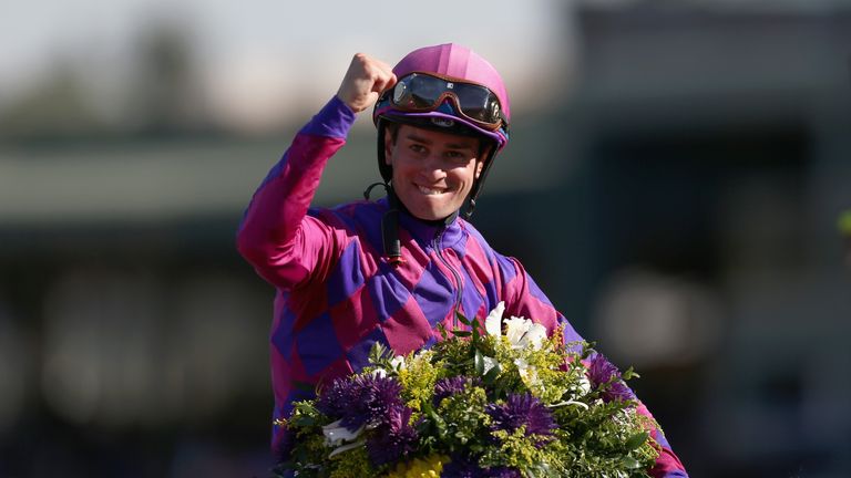 ARCADIA, CA - NOVEMBER 05:  Jockey Flavien Prat riding Obviously celebrates after winning the Turf Sprint race on day two of the 2016 Breeders' Cup World C