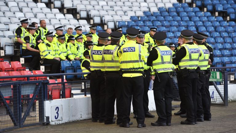 Police are briefed in the lead up to the League Cup semi-final between Rangers and Celtic in October. 