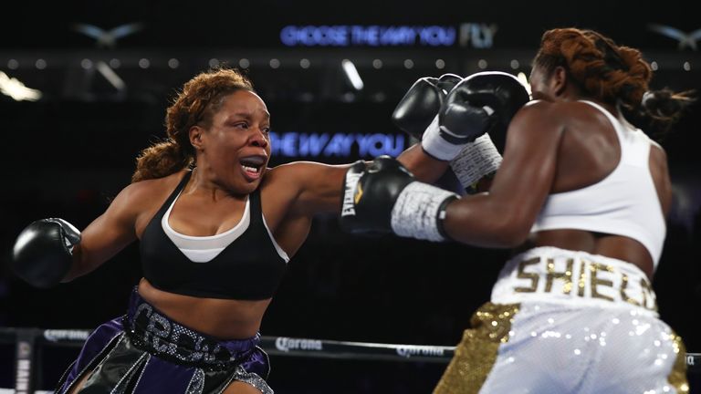 Franchon Crews throws a left against Claressa Shields during their super middleweight bout at T-Mobile Arena on November 19