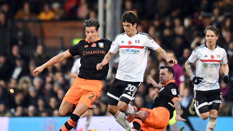 Fulham's Lucas Piazon (centre) battles with Sheffield Wednesday's Sam Hutchinson