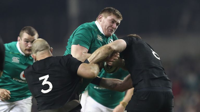 DUBLIN, IRELAND - NOVEMBER 19: Tadhg Furlong of Ireland is tackled during the international rugby match between Ireland and the New Zealand All Blacks at A