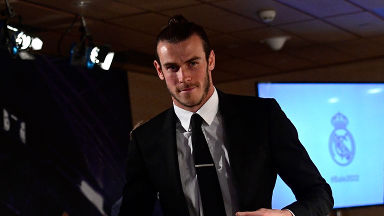 Real Madrid's Welsh forward Gareth Bale leaves a press conference in the media room at the Santiago Bernabeu stadium in Madrid on October 31, 2016. 
Real M