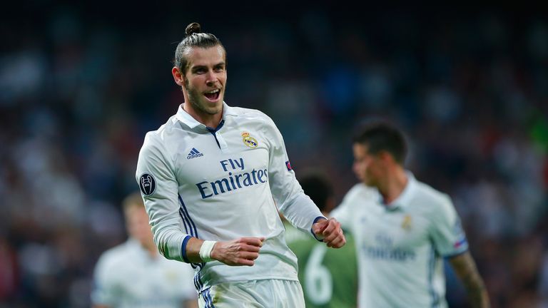 MADRID, SPAIN - OCTOBER 18:  Gareth Bale of Real Madrid celebrates scoring his team's first goal during the UEFA Champions League Group F match between Rea
