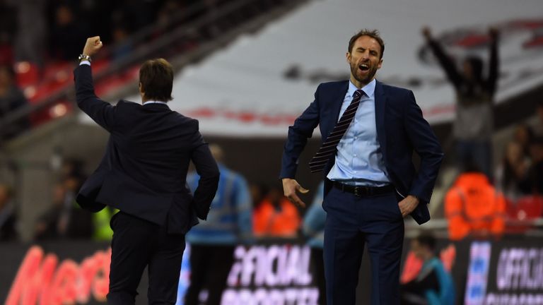  Gareth Southgate interim manager of England reacts as Julen Lopetegui head coach of Spain celebrates
