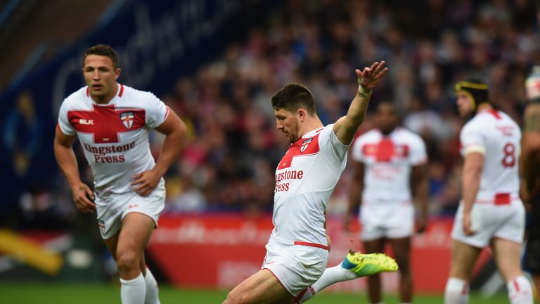 Gareth Widdop of England kicks a penalty 