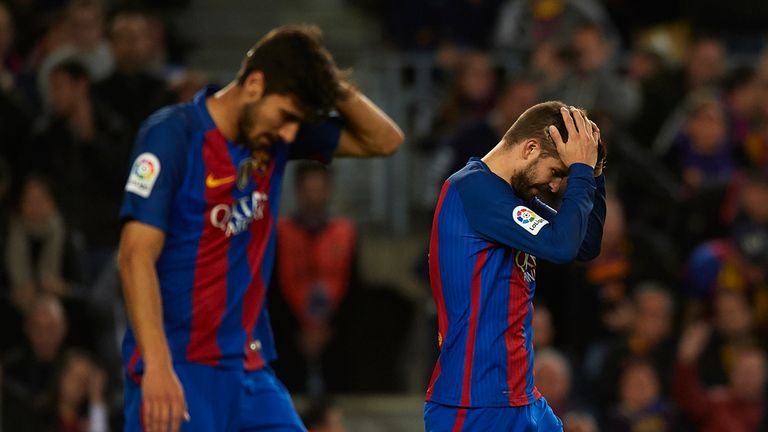 Gerard Pique reacts during Barcelona's frustrating 0-0 draw with Malaga