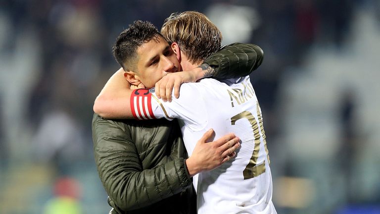 Gianluca Lapadula and Ignazio Abate of AC Milan celebrates after the victory