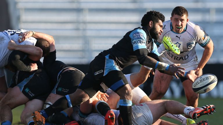 Glasgow's Fijian scrum half Nikola Matawalu passes the ball during the European Rugby Champions Cup rugby union match between Glasgow and Montpellier at Sc