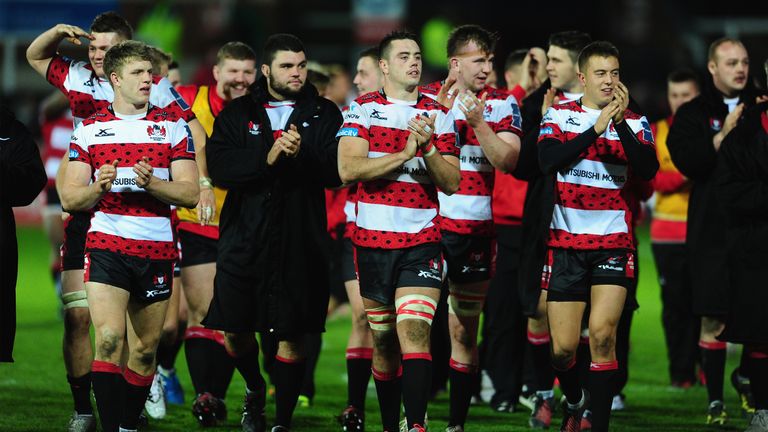 GLOUCESTER, UNITED KINGDOM - NOVEMBER 05: The Gloucester side applaude the fans at the final whistle during the Anglo-Welsh Cup match between Gloucester Ru