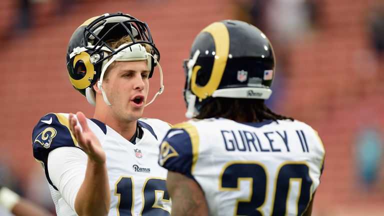 LOS ANGELES, CA - NOVEMBER 20:  Quarterback Jared Goff #16 of the Los Angeles Rams greets teammate Todd Gurley #30 during warm ups for the game against the