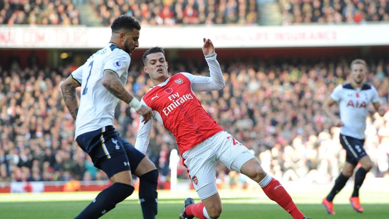 Granit Xhaka tackles Kyle Walker during Arsenal's 1-1 draw with Tottenahm