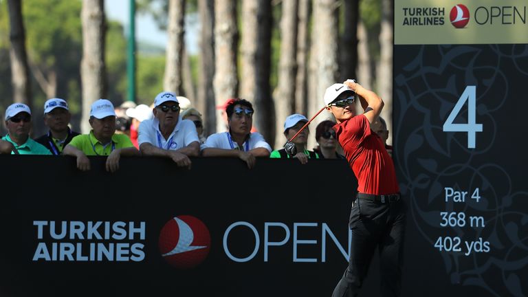 ANTALYA, TURKEY - NOVEMBER 06:  Haotong Li of China hits his tee shot on the 4th hole during day four of the Turkish Airlines Open at the Regnum Carya Golf