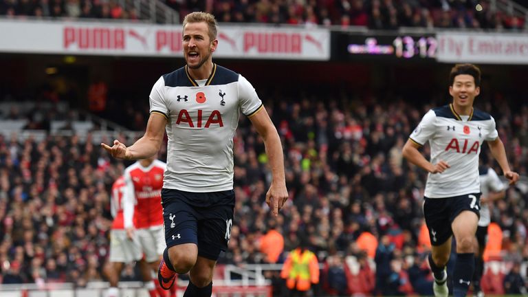 Tottenham striker Harry Kane celebrates after scoring from the penalty spot against Arsenal