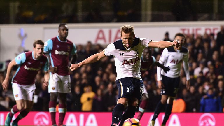 Harry Kane of Tottenham Hotspur scores his sides third goal from the penalty spot
