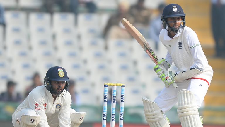 England batsman Haseeb Hameed plays a shot as on Indian wicketkeeper Parthiv Patel looks on, on the fourth day of the third cricket Test match between Indi