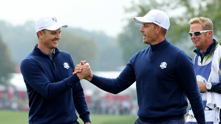 CHASKA, MN - SEPTEMBER 30: Henrik Stenson and Justin Rose of Europe react on the ninth green during morning foursome matches of the 2016 Ryder Cup at Hazel