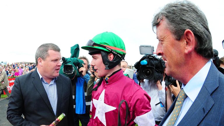 Jockey Donagh Meyler speaks with trainer Gordon Elliott (left) and owner of the Gigginstown Stud Eddie O'Leary