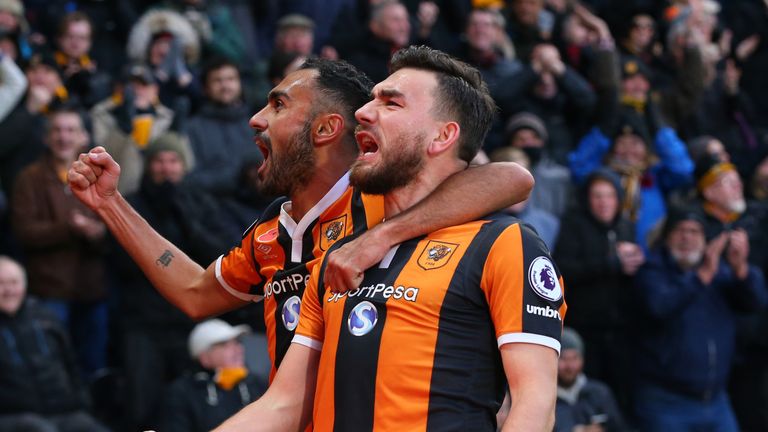 Hull's Robert Snodgrass  celebrates scoring his side's first goal with Ahmed Elmohamady