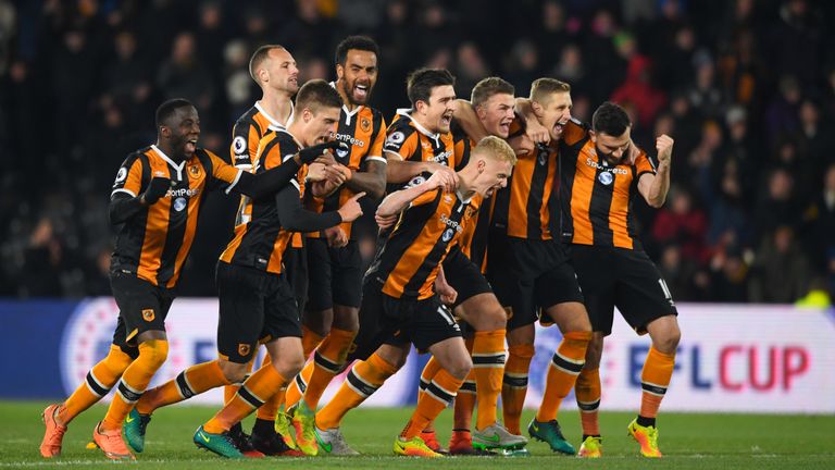 HULL, ENGLAND - NOVEMBER 29:  Hull City players celebrate following victory in the penalty shoot out after the EFL Cup Quarter-Final match between Hull Cit
