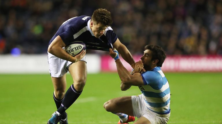 Huw Jones of Scotland is tackled by Matias Orlando of Argentina 