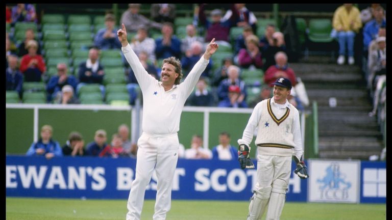 Ian Botham salutes the crowd in his final game before retiring in 1993