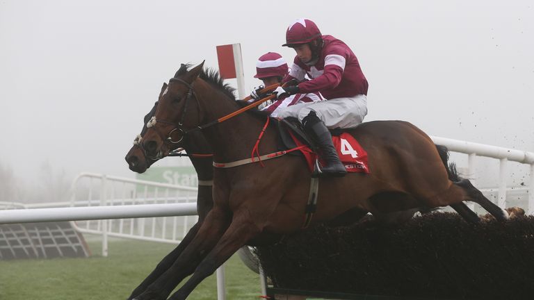 Identity Thief and Bryan Cooper clear the last fence on their way to winning the Ryans Cleaning Craddockstown Novice Chase at Punchestown.