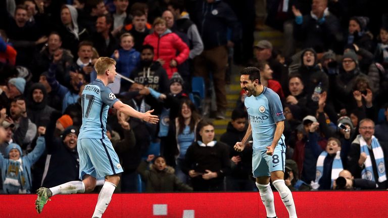 Manchester City's Ilkay Gundogan celebrates scoring his side's third goal of the game with Kevin De Bruyne (left) during the UEFA Champions League match at