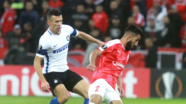 Inter Milan's Ivan Perisic vies for possession against Hapoel Be'er Sheva