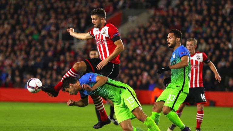 SOUTHAMPTON, ENGLAND - NOVEMBER 03:  Andrea Ranocchia of Internazionale clears the ball as he is put under pressure from Jay Rodriguez of Southampton  duri