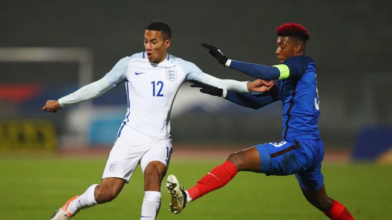PARIS, FRANCE - NOVEMBER 14:  Isaac Hayden of England U21 is challenged by Presnel Kimpembe of France U21 during the U21 international friendly match betwe